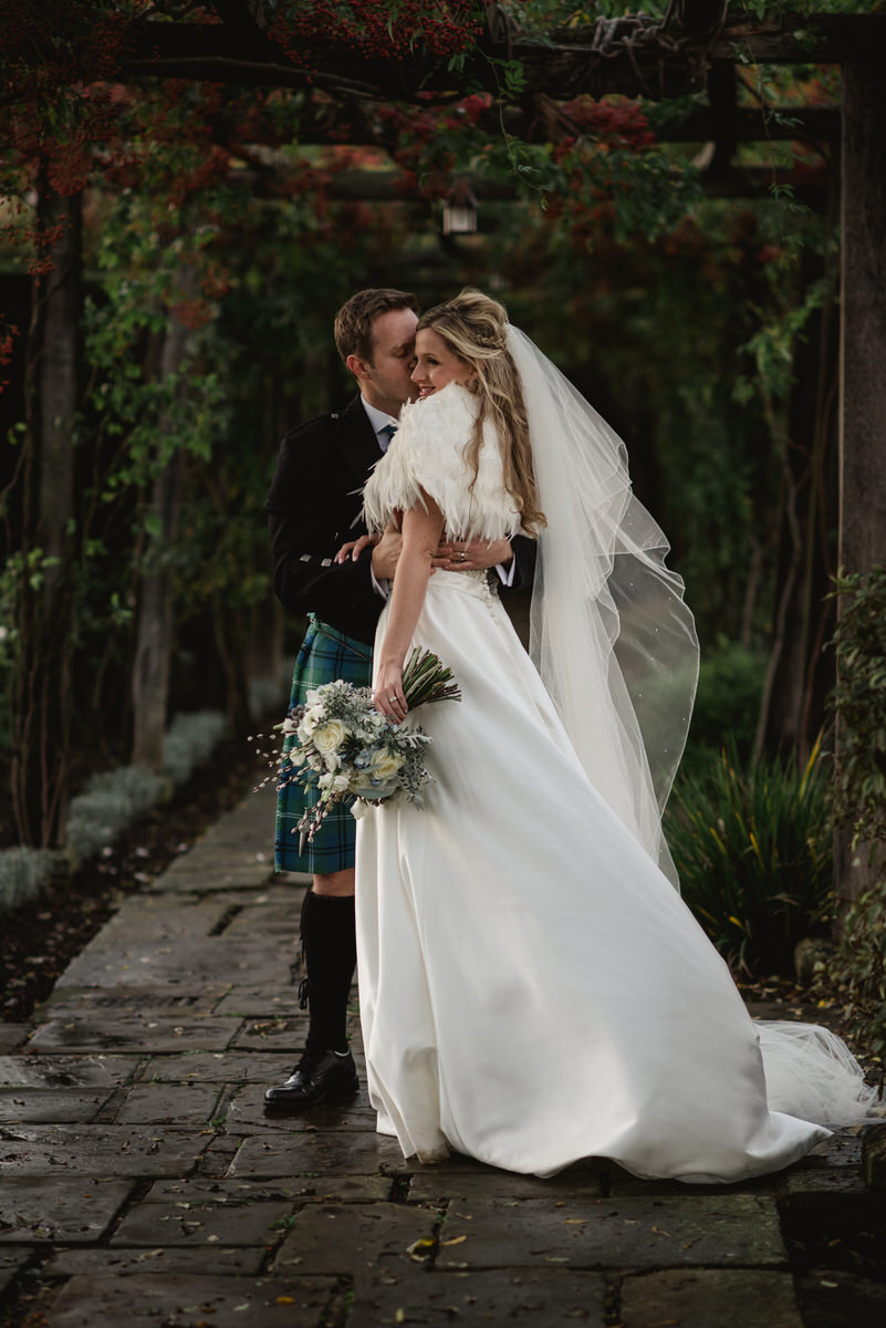 Great Fosters winter wedding couple